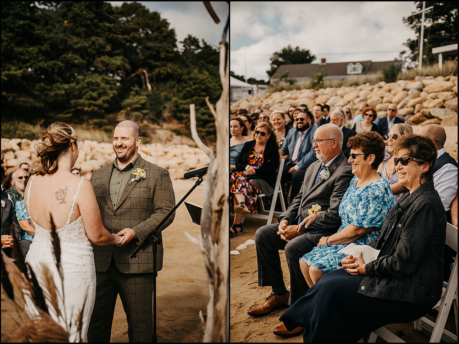 Wedding guests smile as they watch a beach wedding ceremony.