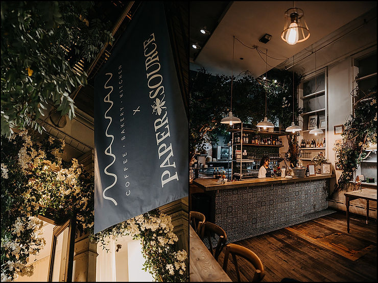 A black sign hangs outside Maman Tribeca.